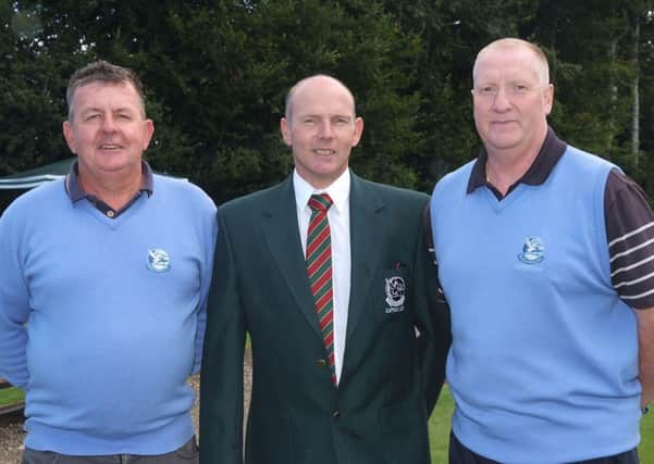 Terry Dornan, centre, pictured with Martin Carlin, left, and Cecil King, past captain, during his Captain's Day competition at Faughan Valley Golf Club. INLS3213-112KM
