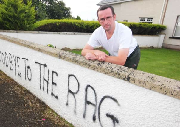Coleraine Borough Councillor George Duddy at his home outside Coleraine which had graffiti  sprayed on the wall in the early hours of Sunday morning. Councillor also had a union flag stolen.PICTURE MARK JAMIESON.