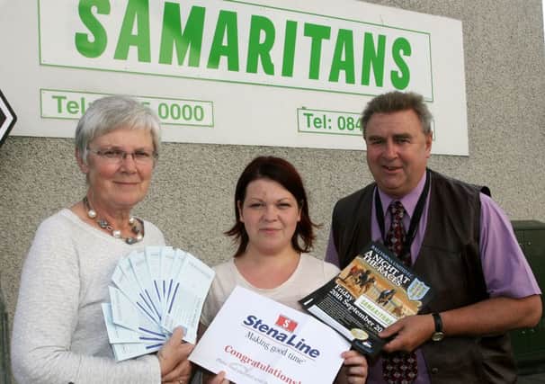 Brian Thompson of Ballymena United, is pictured with Margaret Black and Fiona McGarry of the Samaritans, promoting the Night at the Races on Friday 20 September. INBT32-222AC