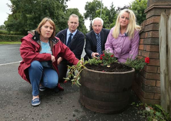Pictured in Hillsborough following the vandalism over the weekend to many floral planters and displays, organised by both the Community Group and the Council's gardening teams, are (l-r) Cllr Jenny Palmer, Chair of Lisburn City Council's Environmental Services Committee; Mark Gregg, Plants Manager with the Council; David Reid and Dawn McEntee from the Hillsborough Village Community Group.