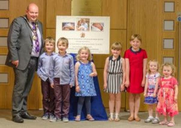 The Mayor of Craigavon, Councillor Mark Baxter, welcomes some of his young guests, from left, George and Louie Dreaning, Charlotte Baxter, Poppy and Eve Jones, Paige McClelland and Faith Baxter. INLM33-036