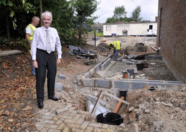 Ceara School principal, Dr Peter Cunningham at the area of foundations and drains which have to be rebuilt. INLM33-118gc