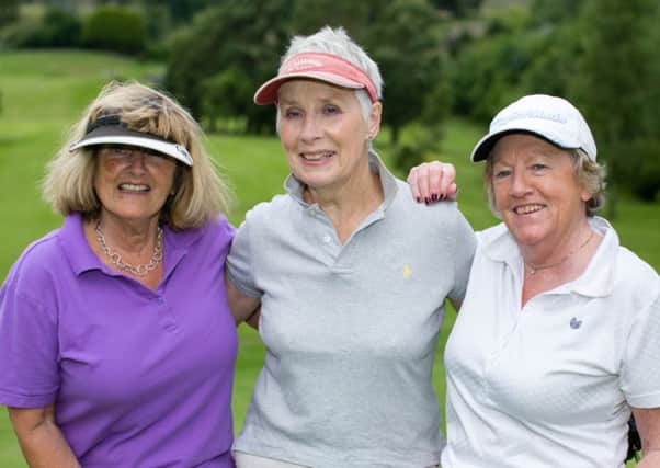 Andre Brooks, Irene Trotter and Olive McLaughlin on the ninth green at Greenisland GC Lady Captain's Day. INLT 33-417-RM