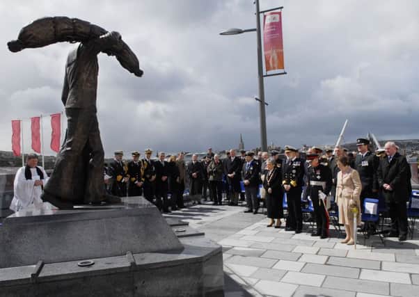 HRH Prince Michael of Kent joins invited guests in a minutes silence at the unveiling of the international sailor statue at Ebrington Square earlier this year.