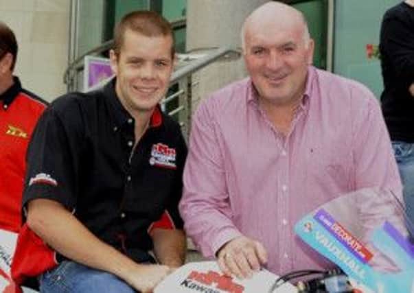 Ballyclare's Jamie Hamilton pictured with Noel Johnston, clerk of the course for the Ulster Grand Prix