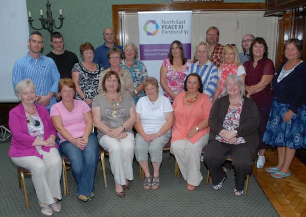 Larne Mayor Maureen Morrow (front, third left) at the North East Peace 3 Partnership Larne Community Cohesion Project meeting in the Londonderry Arms Hotel, Carnlough. INLT 32-412-PR