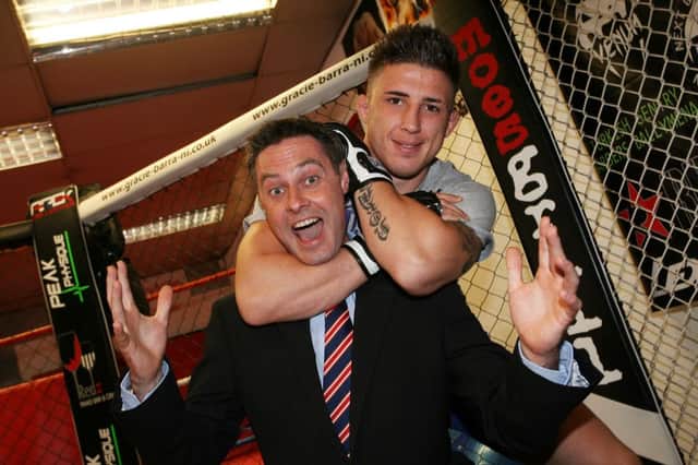 Paul Frew MLA, meets mixed martial artist Norman Parke who has success in recent tournament abroad. INBT34-204AC