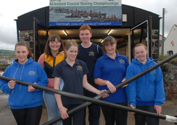 Katie McKeegan, Rosie Hunter, Katie Burns, Colm O'Neill, Mary Anne Hunter and Clodagh Irvine busy preparing for the All Ireland Coastal Rowing Championships. INLT 34-307_PR