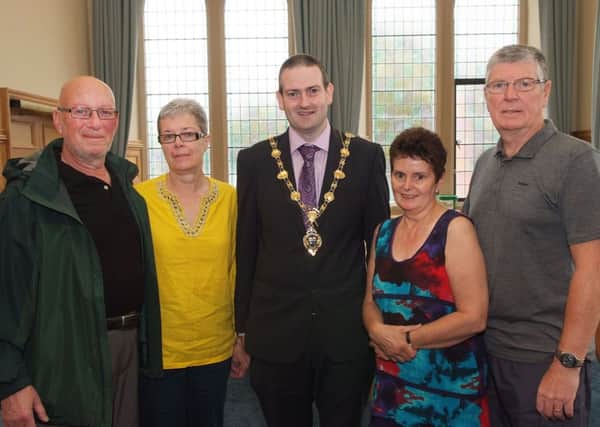 The Mayor, Councillor Martin Reilly hosted Canadian visitors, Calder and Louise Morrison, left, in the Guildhall on Thursday. Included are Elish and Paul O'Kane. INLS3413-115KM