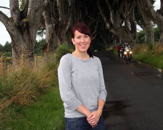 Clare Cushnahan at the Dark Hedges. The local resident says she has been inundated with enquiries about the location of the tourist attraction.INBM34-13 135L