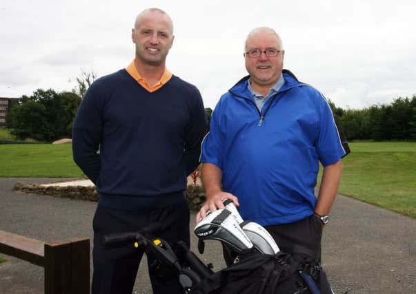 Gary Crabbe and Garry Robinson waiting to tee off during Presidents Day at Galgorm Castle Golf Club. INBT33-234AC