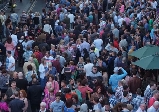 The large crowd which enjoyed live music at Shipquay Street during Fleadh Cheoil. INLS3413-181KM