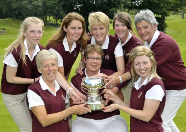 Melanie Mitchell (Team Captain) pictured with the Royal Portrush Ladies team after their voctory over Kilkenny Golf Club in the 2013 All Ireland Senior Cup final at Portuma Golf Club today (17/08/2013). From left Hannah Henderson, Helen Jones (Lady Captain, Royal Portrush), Naoimh Quigg, Victoria Bradshaw, Collette McNicholl, Maud Wilson (Team Manager) and Lucy Simpson. Picture by Pat Cashman