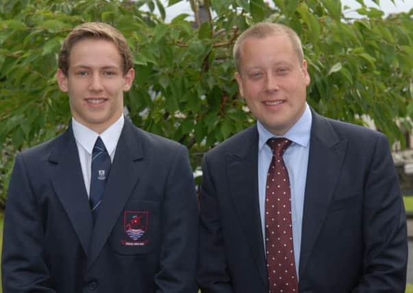 Lee Murray achieved 4 A grades at AS Level. With him is Larne Grammar School Principal Mr Wylie. INLT 34-320-PR