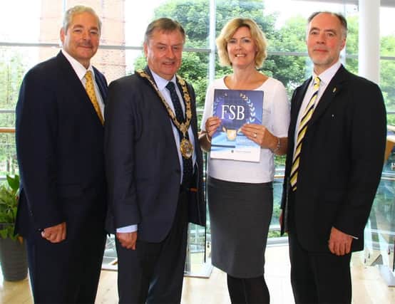 Pictured from left are Wilfred Mitchell OBE, FSB Policy Chairman; Mayor Fraser Agnew; Sharon Logue, Newtownabbey Councils Procurement Manager and Roger Pollen, Head of External Affairs, FSB. INNT 34-509CON