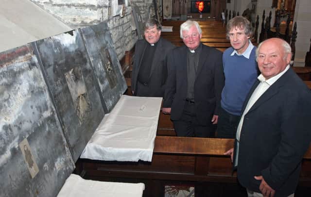 Belfast born painter and sculpture Colin M.Corkey (third from left), who opened an exhibition of his work in St.Columbs Cathedral, pictured with the Dean of Derry , Dr. William Morton,  Canon John Merrick and Dr. Sam Burnside.  INLS 3413-501MT.