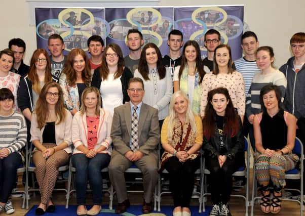 Sperrin Integrated College Principal Mr Alastair Rowan with students who achieved outstanding success at A'Level.INMM3413-310SR