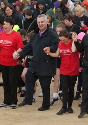 Eamonn Holmes puts his best foot forward during the Children in Crossfire Riverdance. INLS3413-184KM