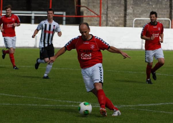 Pat McShane in action for Larne.