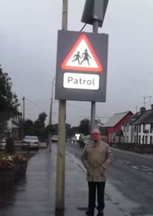 SF Cllr Paul Maguire pictured in front of one of the newly installed traffic calming measures in Cargan.