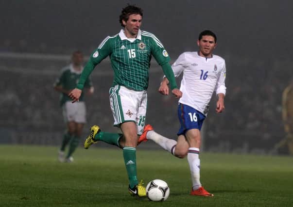 Paddy McCourt in full flow for Northern Ireland.