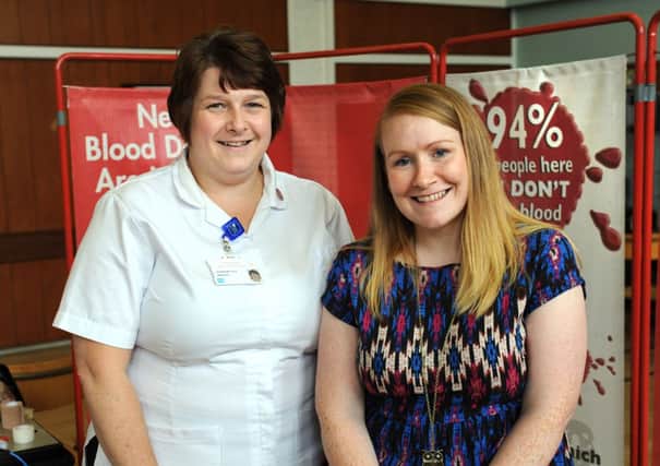 Tyrone Times reporter Shauna Corr, with staff nurse Jacqueline Kyle at the Blood Donations centre in Dungannon. INMM3513-122ar.