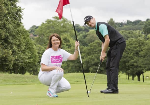 Teresa Sloan from CLIC Sargent joins European Tour golfer and Russian Open Champion Michael Hoey to celebrate the news that the European Challenge Tour has selected CLIC Sargent as the official charity for the forthcoming NI Open.  The tournament tees of at Galgorm Castle Golf Club on Thursday 29 August and will feature some of Europes top golfing talent including local players Michael Hoey, Simon Shaw and Alan Dunbar.  All monies raised from the event will go directly to the CLIC Sargent NI Homes from Home Appeal.
 Picture by Brian Morrison.