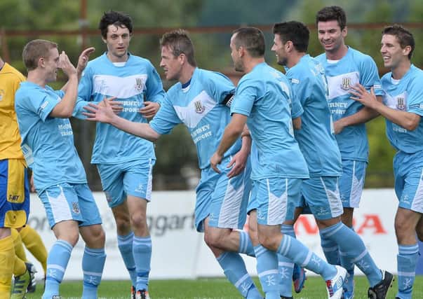 Allan Jenkins celebrates after putting Ballymena
 United ahead against Dungannon. Picture: Press Eye.