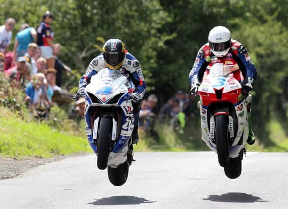 ©Press Eye Ltd Northern Ireland 27th July 2013 - 
Mandatory Credit - Picture by Jonathan Porter/Presseye.com

Guy Martin and Michael Dunlop in the Supersport race at the Armoy road races, Co. Antrim.
