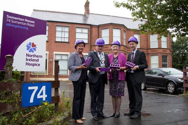 Newtownabbey Borough Council chief executive Jacqui Dixon, Mayor Fraser Agnew, NI Hospice chief executive, Professor Dame Judith Hill and NI Hospice fundraising and marketing manager, Marcus Cooper at the NI Hospice site on Somerton Road. INNT 35-512CON