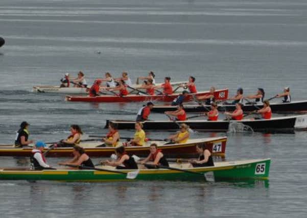 Rowers at the All-Ireland Coastal Rowing Championships. INLT 35-449-PR