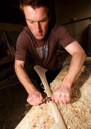 Michael Scullion manufactures Hurling Sticks and Sliotars at his factory in Loughgiel.