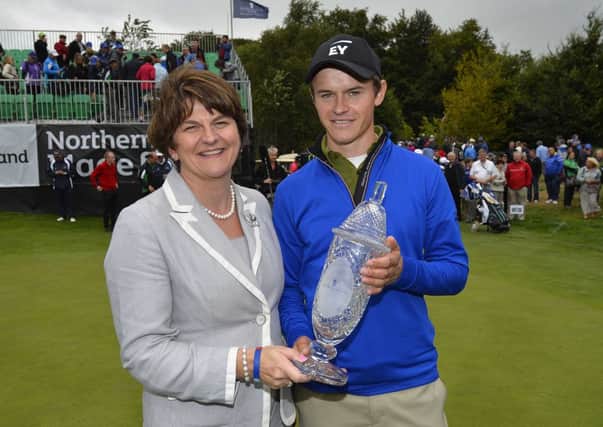 Daan Huizing from the Netherlands is presented with the trophy by Arlene Foster, Northern Ireland Minister for Enterprise, Trade and Investment, after winning the inaugural Northern Ireland Open at Galgorm Castle Golf Club. Picture: Press Eye.