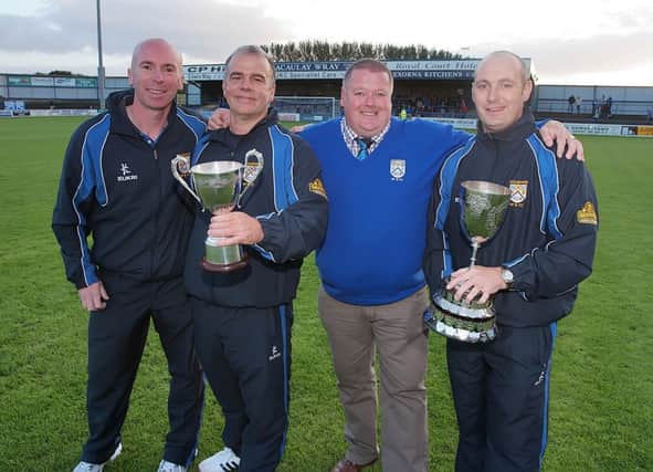 Stephen McCartney, Trevor Harper, Gareth Godfrey and Derek Cooke show off League and Cup Silverware at the Showground prior to the Coleraine v Crusaders match