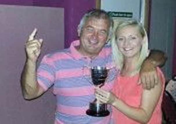 James Boyle and Lynsey Smythe celebrate their success at Larne Bowls and Lawn Tennis Captain's Day. INLT 36-930-CON
