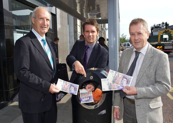 Launching the campaign against littering are, from left, Arnold Hatch, Regional Editor Alistair Bushe and Trevor Clydesdale.
