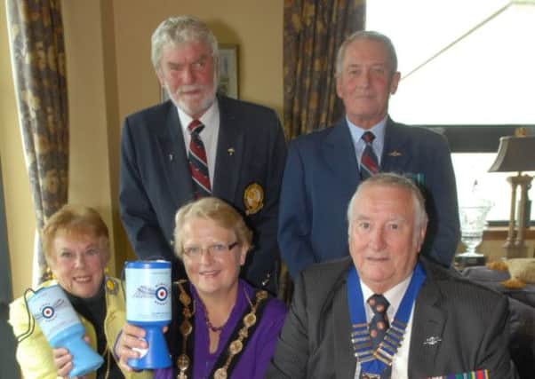 Launching the Lisburn RAF Association 70th Wings Appeal with the help of Lisburn Mayor Margaret Tolerton are  Norma Farmer, Wings Appeal officer, Phil Price, MBE, chairman, Stuart Sturdy, president, and Steve Ings, secretary. INUS3413-WINGS