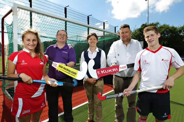 Hockey players Pippa Best and Michael Robson pictured with Alan McMurray, Terry Jackson (Kukri) and Angela Platt of Ulster Hockey.