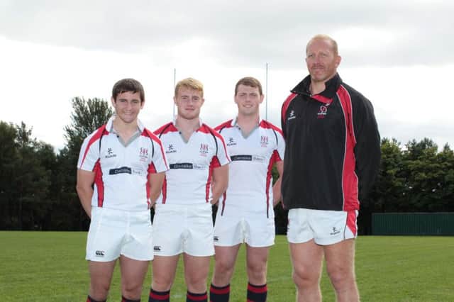 Danske Bank Ulster Schools rugby players Andrew McGrath, Josh McIlroy and Duncan Maguire are pictured with their coach John Andrews. A fourth local player, Michael Gillan, has also been included in the squad.