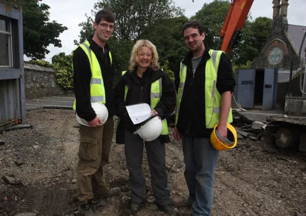 Archealogist Emily Murray with Dermot Redmond and Brian Sloan at the Bishop St Car Park site where they will be carrying out an excavation.  (DER3713JB033)