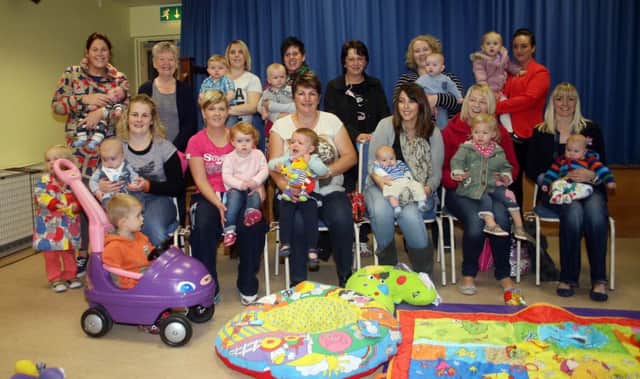 Mothers and children and helpers pictured at the first Tilly Tots gathering in Armoy Community Centre.INBM38-13 502L