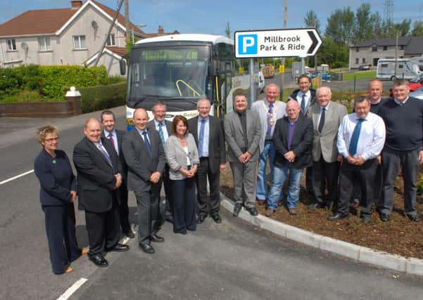 Transport Minister Danny Kennedy with councillors and officials at the opening of the Park & Ride at Millbrook. INLT 24-395-PR