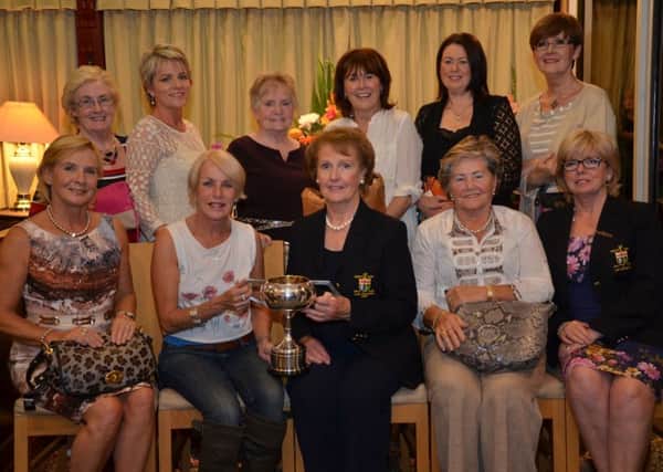 Prizewinners from the North West Lady President's Day. Front row left to right: Ann O'Neill, Ann McCloskey (winner), Lady President Una Grant, Cecilia McCoal and Lady Captain, Helen Quigley. 
Back row left to right: Stella O'Carolyn, Lorainne McGettigan, Muireanna Friel, Augusta Neff, Joanne Harkin and Aileen MacManus.
