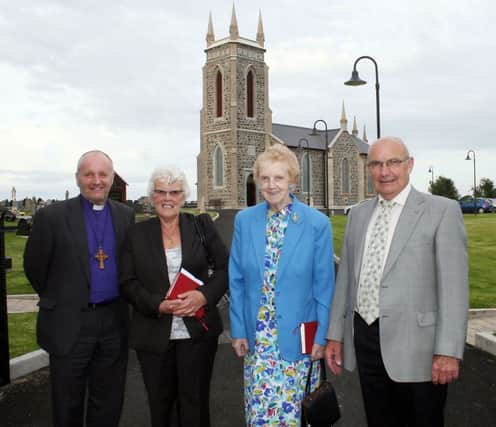 The Bishop of Connor The Rt,. Rev'd Alan Abernethy with some of the first arrivals at St. Colman's Church Maurice and Eileen McAleese and Jean McAleese.INBM37-13 241L