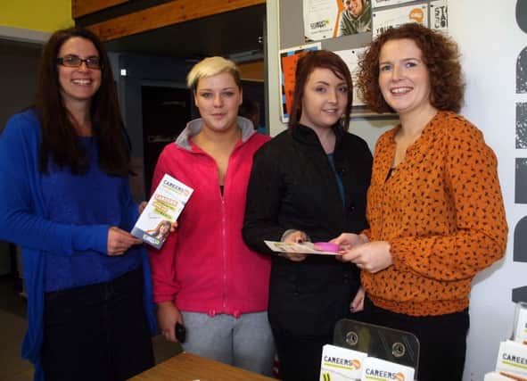 Careers advice given by Julie Hemphill (left) and Fiona McDowell (right) to Jade Caldwell (second left) and Lizzie Morrow at the NRC open day in Ballymoney.INBM38-13 504L