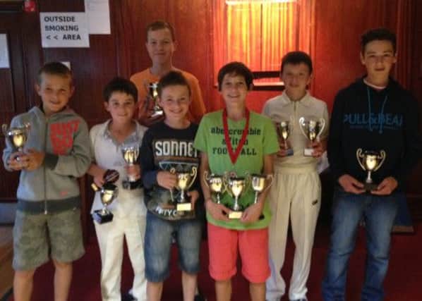 A group of the various youth trophy winners.