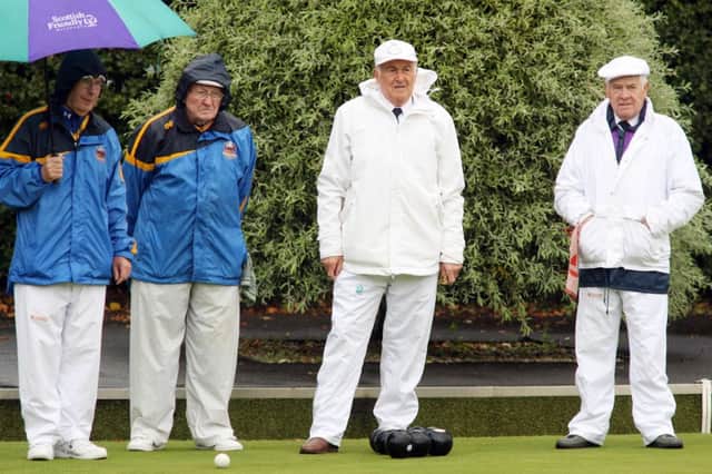 Bowlers brave the rain during the NIPBA Veterans Finals at Coleraine Bowling Club on Thursday.
