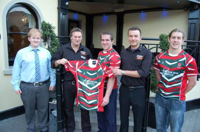 The Anchor Bar Portstewart present UUC RFC their new 2013-14 kit inspired by the legendary Leicester Tigers strip, presenting the strip to Dave Orr, Club Captain, to his left is Stevie O'Kane, Bar Manager and Timmy O'Kane, Assistant Bar Manager also present in the picture is Club Manager Gareth Bell and Club Social Secretary Joe McKinney.