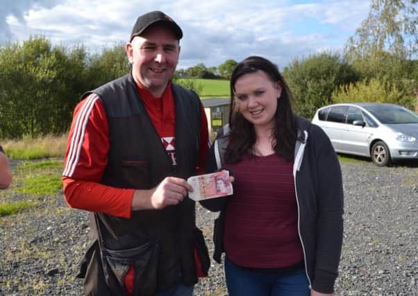 Rachael Ervine pictured with shoot winner Alan Fowler.