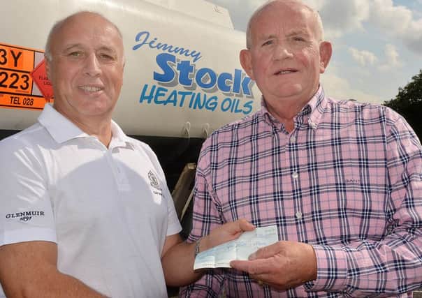 Jimmy Stock, Jimmy Stock Heating Oils, presented a sponsorship to Jim Drennan, Ballymena Golf Club Captain for last Saturday's competition. INBT 37-802H